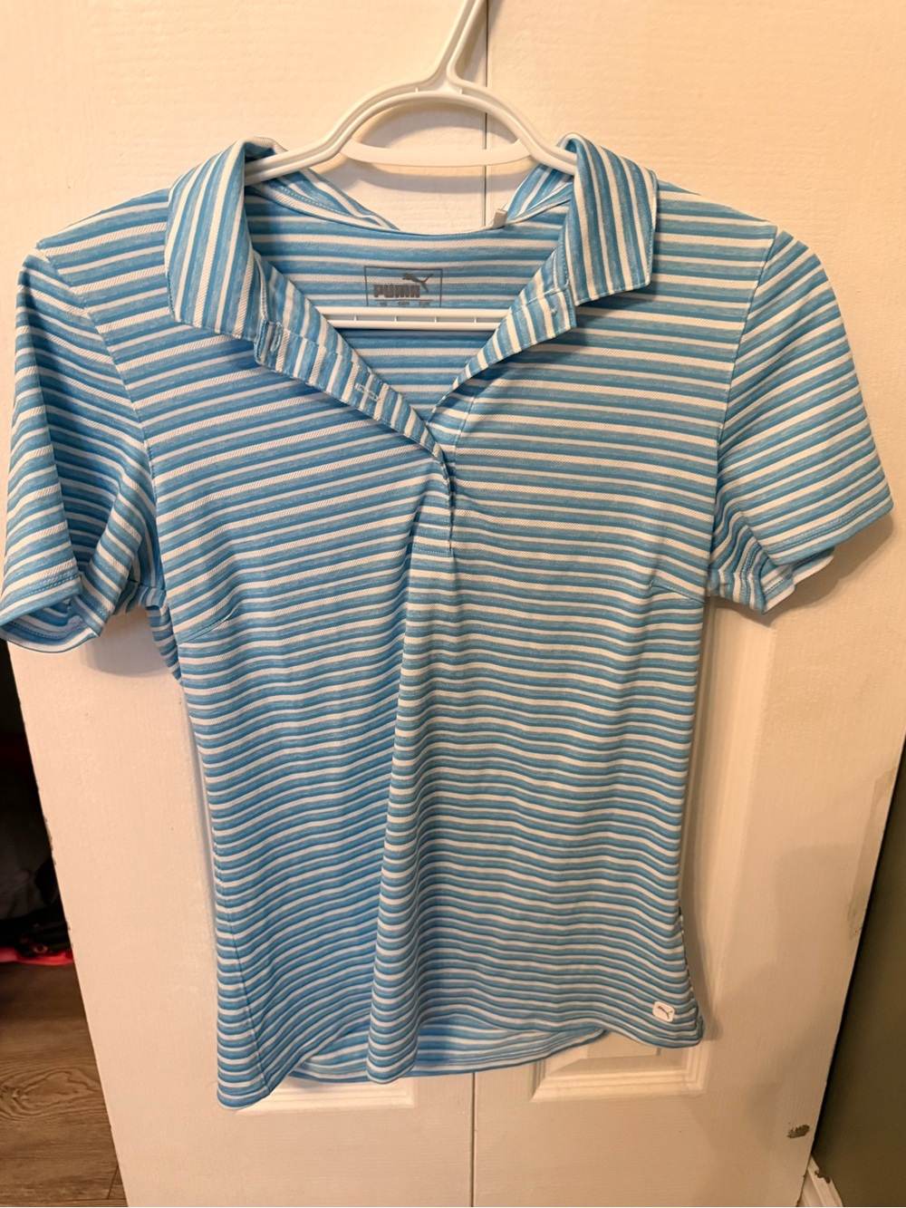 Puma Women’s Blue and White Striped Polo Shirt
